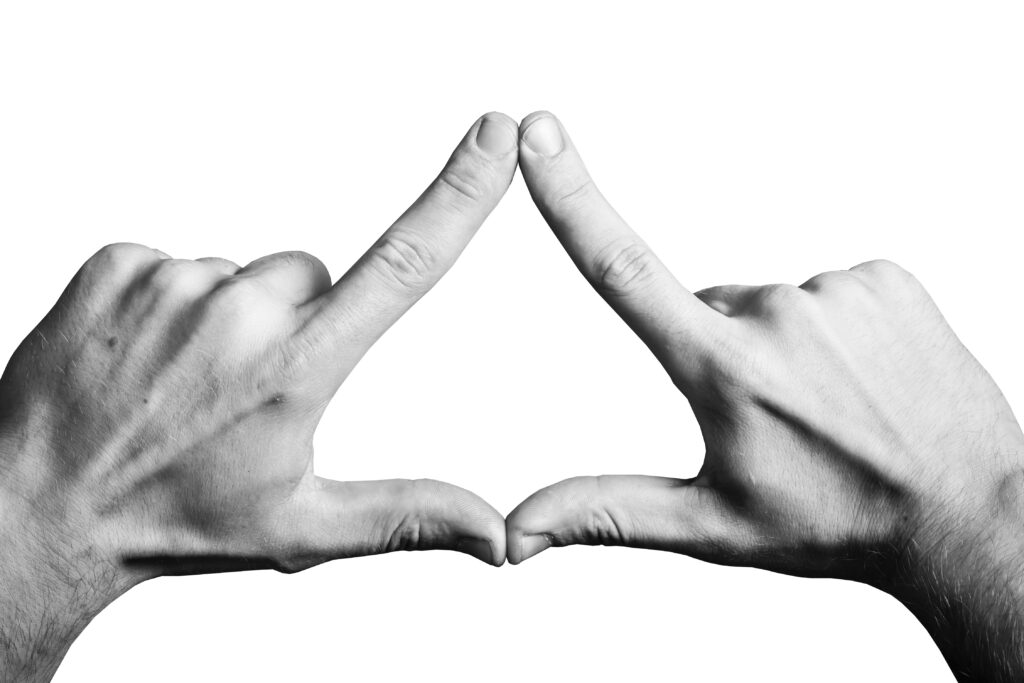 Triangle shape made with hands